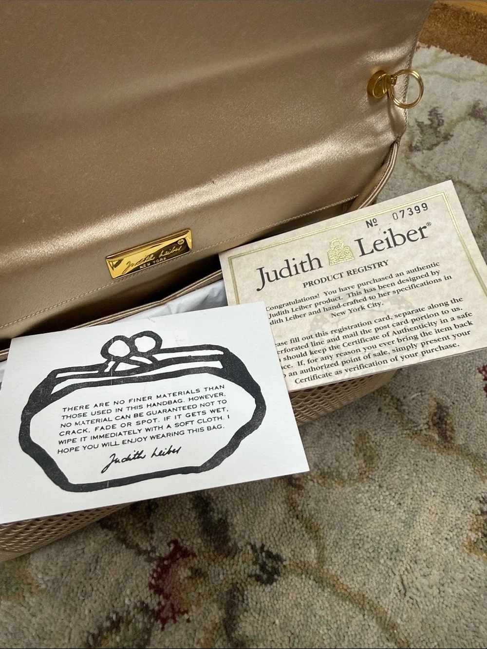 Judith Leiber chic champagne
